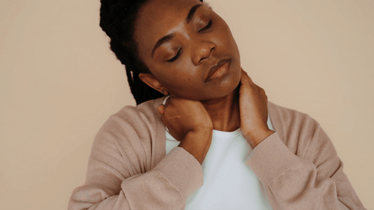 Women performing side neck stretch to relieve muscle tension